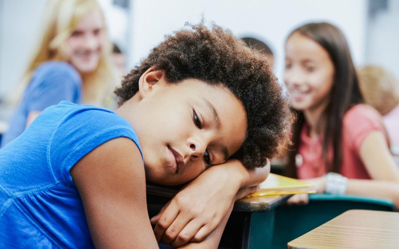 Unhappy Girl Being Bullied In Class