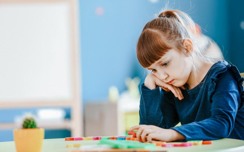 Little girl with autistic disorder in playroom