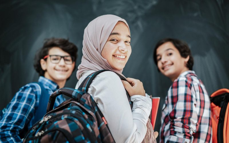 Group of multy ethnic kids in classroom space