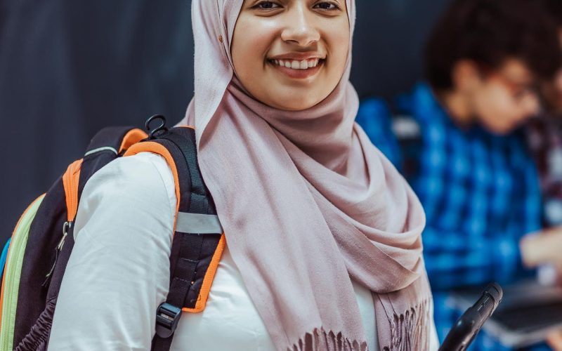 Modern arab teens use smartphone, tablet and latpop to study during online classes due to corona virus pandemic