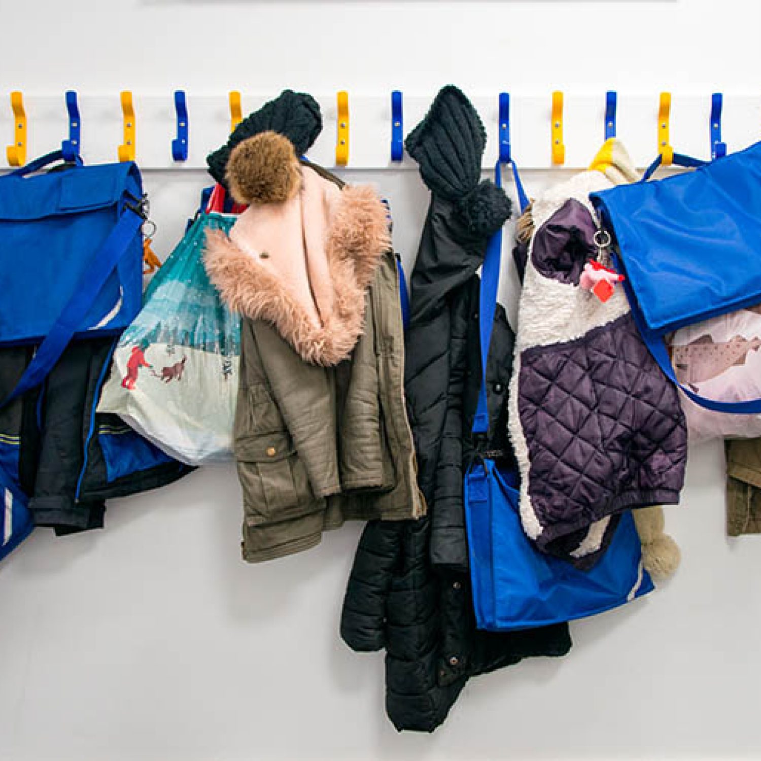 Rack of coats on pegs